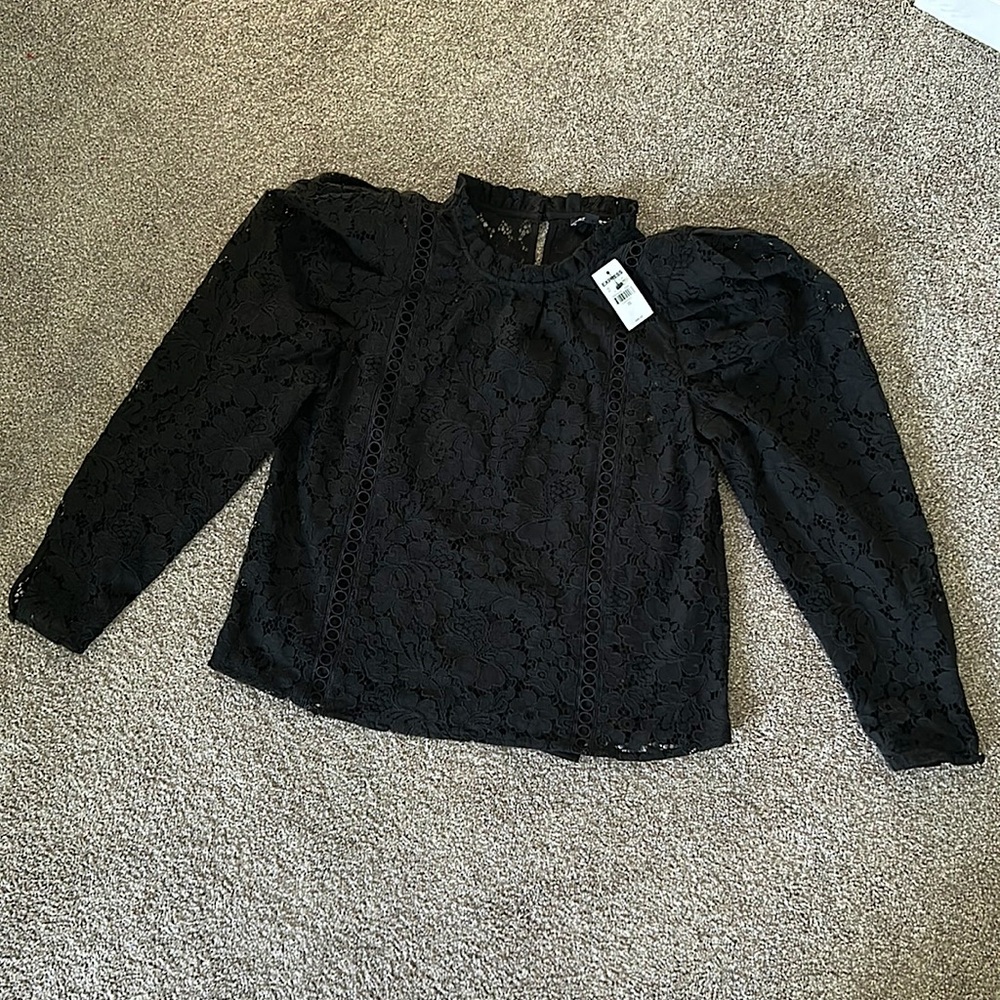 Express lace top with built in cami. Originally $88 selling for $40. Never worn